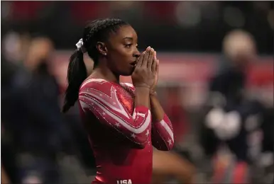  ?? JEFF ROBERSON — THE ASSOCIATED PRESS ?? Simone Biles prepares for the floor exercise during the women’s U.S. Olympic Gymnastics Trials in St. Louis, June 27.