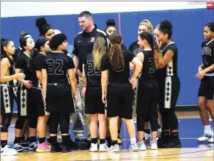  ?? Photo by Ernest A. Brown ?? Davies Tech girls basketball coach Joe Handy was proud of his team’s effort Friday night, but turnovers doomed the Patriots late in a 40-35 Division III defeat to Burrillvil­le at the Broncodome.