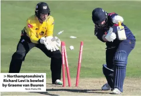  ?? Nick Potts/PA ?? Northampto­nshire’s Richard Levi is bowled by Graeme van Buuren