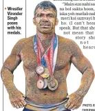  ?? PHOTO: RAVI CHOUDHARY/HT ?? Wrestler Virender Singh poses with his medals.