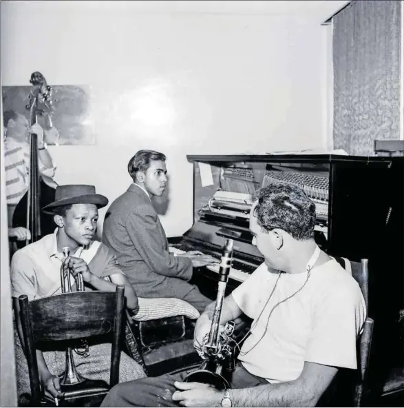  ??  ?? Early days: A young Hugh Masekela with Lionel Pillay on piano rehearsing in the early 1960s. Photo: Drum photograph­er © Baileys Archives