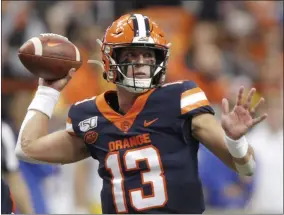  ?? NICK LISI - THE ASSOCIATED PRESS ?? Syracuse’s Tommy DeVito passes the ball during the first quarter of the team’s NCAA college football game against Pittsburgh in Syracuse, N.Y., Friday, Oct. 18, 2019.