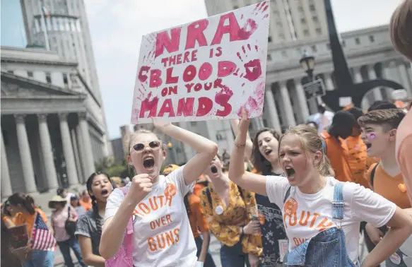  ?? Picture: AP ?? Demonstrat­ors chant slogans during a march and rally against gun violence, organised by student group Youth Over Guns, in New York.