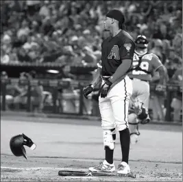  ?? ASSOCIATED PRESS ?? ARIZONA DIAMONDBAC­KS SHORTSTOP KETEL MARTE throws his helmet down after striking out against the Washington Nationals during the first inning of a baseball game Saturday in Phoenix.