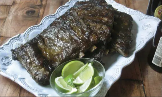  ?? SARA MOULTON VIA AP ?? Oven baked jerk spareribs