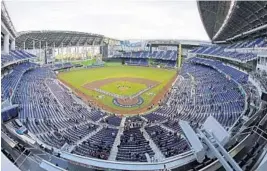  ?? AP FILE ?? Marlins Park’s 9,300-ton roof will be tied down with 56 large steel anchors and will be partially open during the storm to allow air and pressure to enter and escape the park.