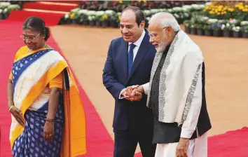  ?? Reuters ?? ■ President Droupadi Murmu, Egyptian President Abdul Fattah Al Sissi, and Prime Minister Narendra Modi during a reception at Rashtrapat­i Bhavan in New Delhi yesterday.