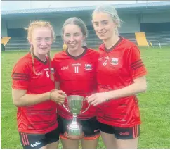  ?? ?? Standing on the shoulders of giants: Mischa Spillane, Maeve Heenan and Leah Geary.