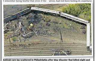  ??  ?? Amtrak cars lay scattered in Philadelph­ia after May disaster that killed eight and injured 200. Engineer Brandon Bostian told probers he remembered little about it.