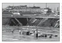  ?? AP/The Post And Courier/GRACE BEAHM ?? Constructi­on crews work in the summer of 2007 on the Mixed Oxide Fuel Fabricatio­n Facility at the Savannah River nuclear complex near Aiken, S.C. Federal funding for the project was cut in 2016.