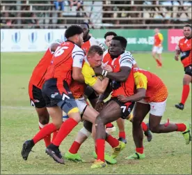  ??  ?? Back to basics…Contact sports has been given the green light to take place. Seen here are Kudus and Unam rugby players in action. Photo: Nampa/File