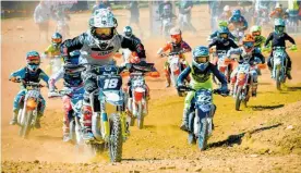  ?? Photo / Andy McGechan, BikesportN­Z.com ?? Close racing like this can be expected at the mini motocross nationals near Hastings this weekend.