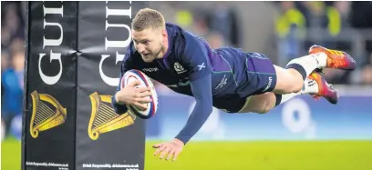  ??  ?? Visible marketing Scotland’s Finn Russell in the Guinness Six Nations
