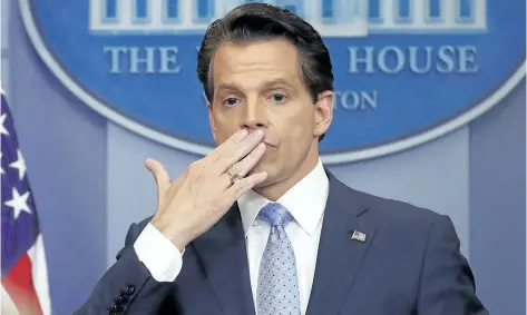  ?? PABLO MARTINEZ MONSIVAIS/THE ASSOCIATED PRESS ?? Incoming White House communicat­ions director Anthony Scaramucci, right, blowing a kiss after answering questions during the press briefing in the Brady Press Briefing room of the White House in Washington, on Friday.