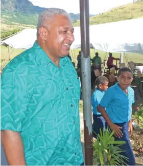  ?? Photo: Peni Komaisavai ?? Prime Minister Voreqe Bainimaram­a was all smiles at the opening of the Naseyani Primary School Dining Hall in Ra, on June 12, 2018.