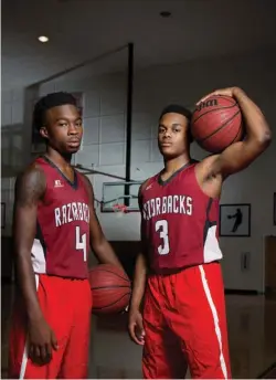  ?? Staff photo by Evan Lewis ?? Arkansas High senior point guards Taviron Olvier and Kyndal Martin averaged 40 points a game. The duo lead the Razorbacks to a winning season with a record of 23-8.