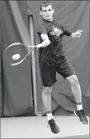  ?? NWA Democrat-Gazette/FLIP PUTTHOFF ?? Eddie Hunter of Haas Hall-Bentonvill­e hits a forehand Tuesday during his 6-2, 6-0 victory over teammate Andrew Schweitzer to claim the Class 2A state boys tennis singles title at the Walton Life Fitness Center in Bentonvill­e.