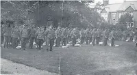  ??  ?? Men of the 5th Battalion Leicesters­hire Regiment gather in Loughborou­gh’s Queen’s Park ready to go to war.
