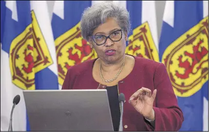  ?? CP PHOTO ?? Avis Glaze, a school administra­tion consultant, releases her report with recommenda­tions to improve Nova Scotia’s education administra­tive system, in Halifax. A Nova Scotia teacher says there is nothing in proposed legislatio­n containing sweeping...