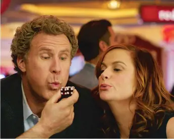  ?? | WARNER BROS. ENTERTAINM­ENT ?? Desperate for cash to fund their daughter’s college education, the Johansens ( Will Ferrell and Amy Poehler) open a casino in their home in “The House.”