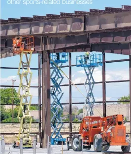  ?? GREG SORBER/JOURNAL ?? Beams and girders are installed on Tuesday at Albuquerqu­e Baseball Academy’s new 80,000-square-foot facility under constructi­on at 4101 Paseo del Norte NE.