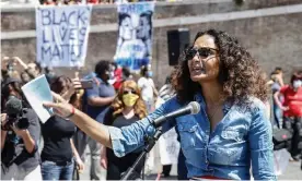  ??  ?? The designer Stella Jean at a Black Lives Matter demonstrat­ion in Rome on 7 June. Photograph: Fabio Frustaci/EPA