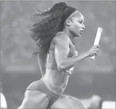  ?? — AFP photo ?? USA’s Natasha Hastings runs with the baton in the final of the women’s 4x400 metres athletics event at the 2015 IAAF World Championsh­ips at the ‘Bird’s Nest’ National Stadium in Beijing.