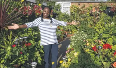  ?? Picture: Chris Davey FM4514638 ?? Tina Titheridge in her garden in Cambridge Road, Canterbury