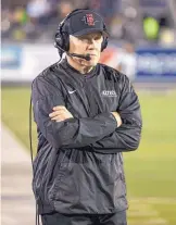  ?? TOM R. SMEDES/ASSOCIATED PRESS ?? San Diego State coach Rocky Long walks the sidelines against Nevada last week. The former New Mexico quarterbac­k and coach brings the Aztecs here to face his alma mater Saturday.