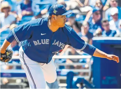  ?? STEVE NESIUS THE CANADIAN PRESS ?? Toronto Blue Jays starter Hyun Jin Ryu pitches against the Detroit Tigers on Friday in Dunedin, Fla.