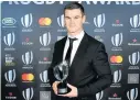  ?? Picture: AFP/ YANN COATSALIOU ?? CREAM OF CROP: Player of the year award winner Johnny Sexton.