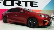  ?? GEOFF ROBINS/AFP/GETTY IMAGES ?? South Korean automaker Kia unveiled its new Forte sedan, which it describes as “bold, strong and ready to rock the compact segment.”