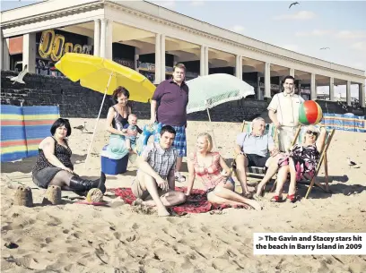  ??  ?? &gt; The Gavin and Stacey stars hit the beach in Barry Island in 2009