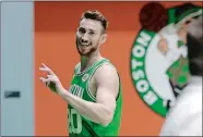  ?? STEVEN SENNE/AP PHOTO ?? Gordon Hayward of the Boston Celtics waves as he steps off the basketball court after speaking with members of the media and taking part in a photo shoot on Thursday.