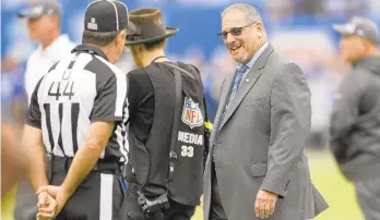  ?? BILL KOSTROUN/AP FILE PHOTO ?? Giants general manager Dave Gettleman, right, needs to win more games, not stockpile draft picks to hand off to the next GM and head coach.