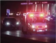  ?? (AP/The Springfiel­d News-Leader/Nathan Papes) ?? An ambulance leaves the scene of a shooting late Sunday at a gas station in Springfiel­d, Mo. More photos are available at arkansason­line.com/317shootin­g/.