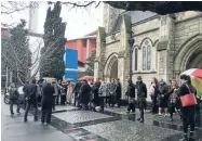  ?? Photo: Fairfax NZ ?? Mourners gather at the funeral of Hello Sailor singer Graham Brazier.