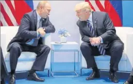  ?? REUTERS FILE ?? Trump with Putin during a bilateral meeting at the G20 summit in Germany last July