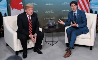  ?? CITIZEN NEWS SERVICE FILE PHOTO ?? Canadian Prime Minister Justin Trudeau meets with U.S. President Donald Trump at the G7 leaders summit in La Malbaie, Que., on Friday, June 8.