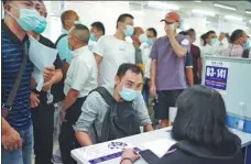  ?? PROVIDED TO CHINA DAILY ?? People seek employment opportunit­ies at a job fair in Dongguan, Guangdong province, on Sunday.