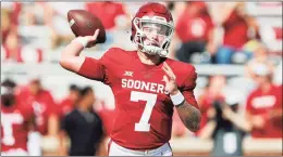  ?? Alonzo Adams / Associated Press ?? Heisman Trophy hopeful Spencer Rattler and No. 3 Oklahoma host Nebraska on Saturday.