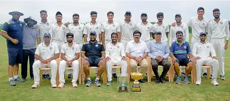  ??  ?? Members of the Hyderabad cricket team pose after winning the all-India Buchi Babu tournament in Chennai on Friday.