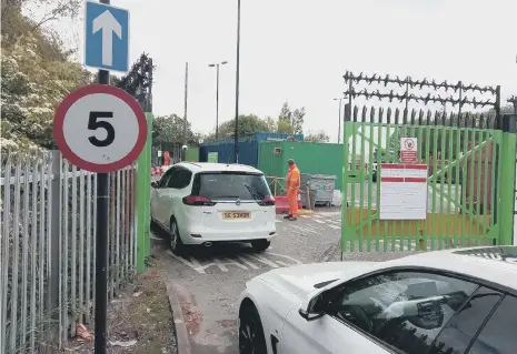  ??  ?? Cars enter the Household Waste and Recycling Centre in Beach Street.