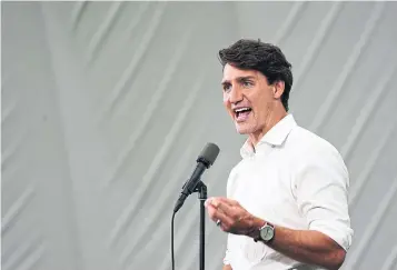  ?? SEAN KILPATRICK THE CANADIAN PRESS ?? When Liberal Leader Justin Trudeau got in trouble with the facts, it was often a product of him overstatin­g his record, or searching to explain his government’s lack of success on past promises.