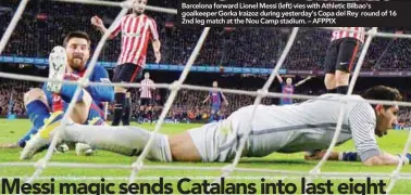  ??  ?? Barcelona forward Lionel Messi (left) vies with Athletic Bilbao’s goalkeeper Gorka Iraizoz during yesterday’s Copa del Rey round of 16 2nd leg match at the Nou Camp stadium. – AFPPIX