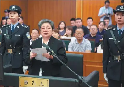  ?? PROVIDED TO CHINA DAILY ?? Yang Xiuzhu, former deputy director of Zhejiang province’s constructi­on department, stands trial on graft charges at the Hangzhou Intermedia­te People’s Court in Zhejiang on Friday.