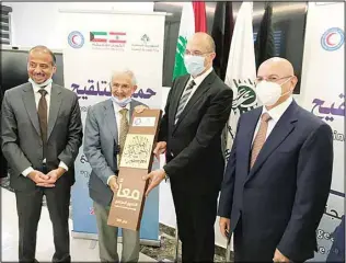  ?? KUNA photo ?? KRCS’ Head Dr Al-Sayer during the signing of the agreement to allocate USD half a million to provide PfizerBioN­Tech vaccines.