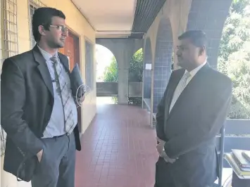  ??  ?? Lawyers Wasu Pillay and Ronald Gordon of Gordon and Company outside the High Court in Lautoka.