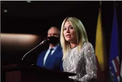  ?? CP PHOTO SEAN KILPATRICK ?? Conservati­ve MP Michelle Rempel Garner speaks as Leader Erin O’Toole looks on during a press conference in Ottawa on Thursday.