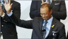  ?? FRANCOIS MORI — THE ASSOCIATED PRESS ?? Tiger Woods acknowledg­es the crowd after being introduced during the opening ceremony of the Ryder Cup at Le Golf National in SaintQuent­in-en-Yvelines, outside Paris on Thursday.